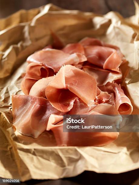 Sliced Prosciutto From The Butcher Stock Photo - Download Image Now - Baloney, Brown Paper, Butcher's Shop