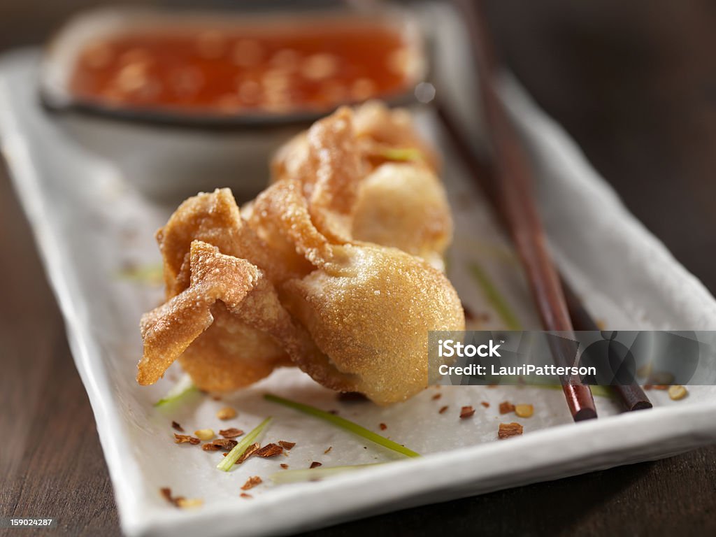 Deep Fried Dumplings with Plum Sauce Deep Fried Dumplings with Plum Sauce -Photographed on Hasselblad H3D2-39mb Camera Appetizer Stock Photo