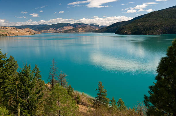 Kalamalka Lake, Okanagan, BC, Canada Kalamalka Lake is a large lake in the Interior Plateau of southern central British Columbia, Canada, east of Okanagan Lake. At different times of the year the colour of the lake can range from cyan to indigo, in different spots at the same time. kamloops stock pictures, royalty-free photos & images