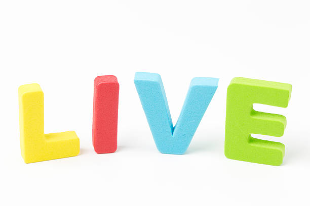 istock LIVE - Foam letters on white background 159025015