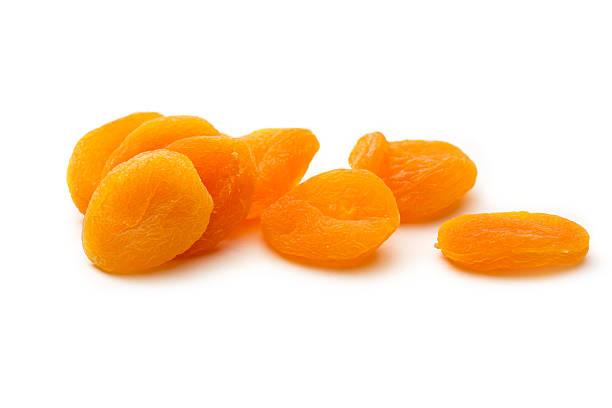istock Dried apricots on white background 159025158