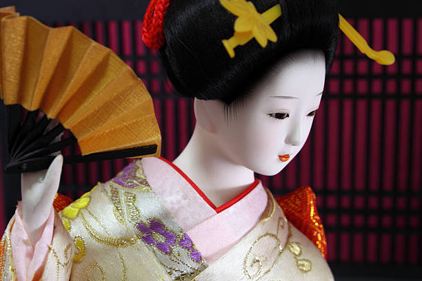Closeup of Japanese Geisha doll, one of the main icons of traditional Japanese culture.