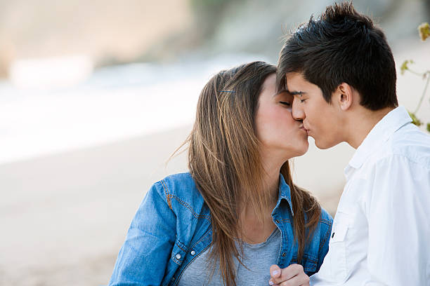 istock Romantic kiss on beach. 159025756