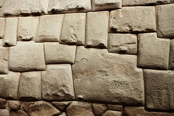 Amazing masonry work in solid Inca stone wall in Cuzco, Peru, famous for its 12-sided stone