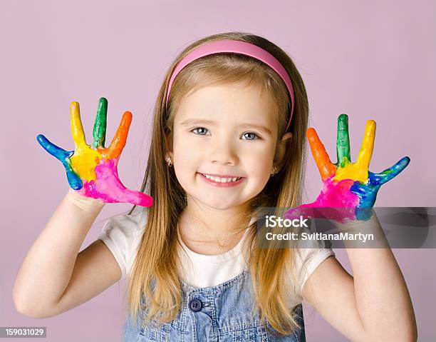 Smiling Little Girl With Hands In The Paint Stock Photo - Download Image Now - Baby - Human Age, Baby Girls, Blue