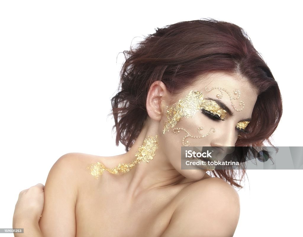 Linda mulher decorados com folha de ouro cosméticos - Foto de stock de Adulto royalty-free