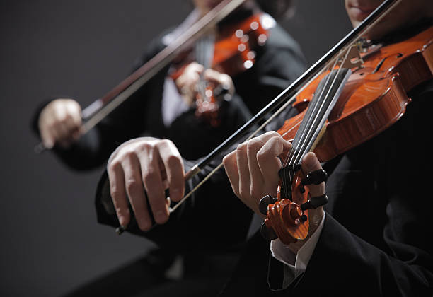 istock Classical music. Violinists in concert 159033428