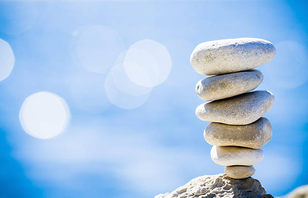 istock Stones balance, pebbles stack over blue sea in Croatia. 159038140