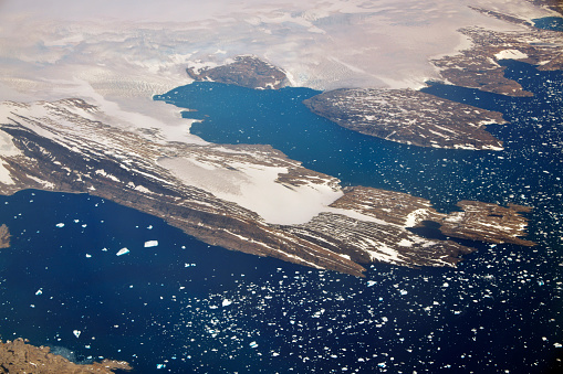 Isertoq, Sermersooq, Greenland: floating ice and intricate coast line with coves and peninsulas - North Atlantic Ocean.