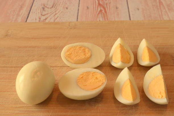 istock Boiled eggs on a wooden board, Easter, healthy cooking 1590409049
