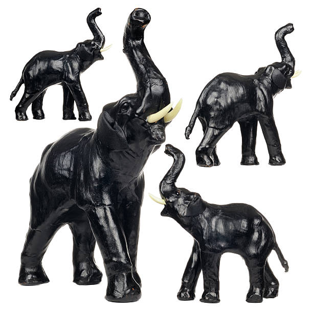 istock Set of Black Leather Elephant Figurines Isolated on White Background 159040992