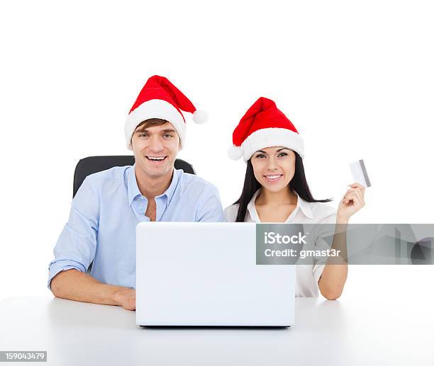 Foto de Casal De Natal e mais fotos de stock de Adulto - Adulto, Ano novo, Boné