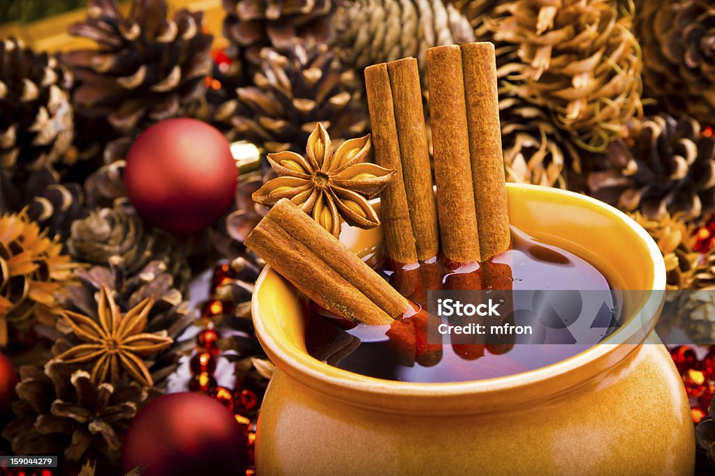 Mulled wine in brown jug with cinnamon and anise Mulled wine in brown jug with cinnamon and aniseMulled wine in brown jug with cinnamon and aniseMulled wine in brown jug with cinnamon and anise Alcohol - Drink Stock Photo