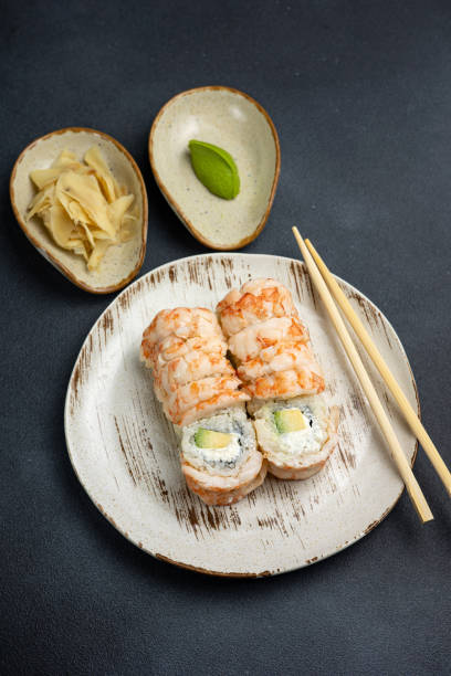 istock Philadelphia roll with shrimp and avocado. 1590444047