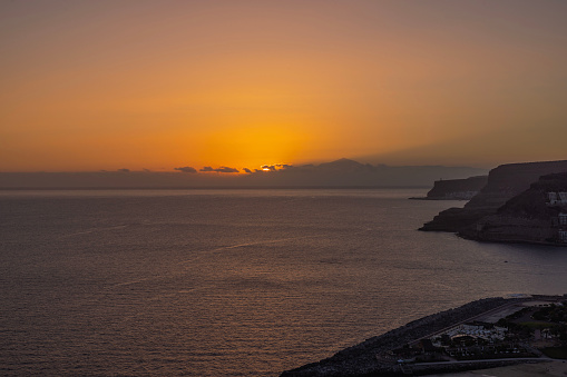 Beautiful view of sunset in Atlantic Ocean on island of Gran Canaria. Spain.
