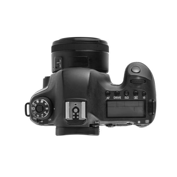 istock Top View of Modern DSLR Camera Isolated on a White Background 1590521765