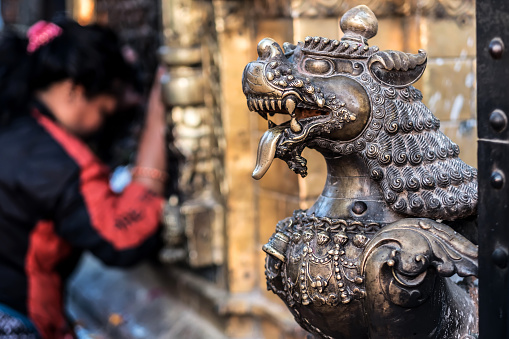 Bhaktapur , Nepal - March 28, 2016: Close-up photo of lion bronze head statue at Durbar Square