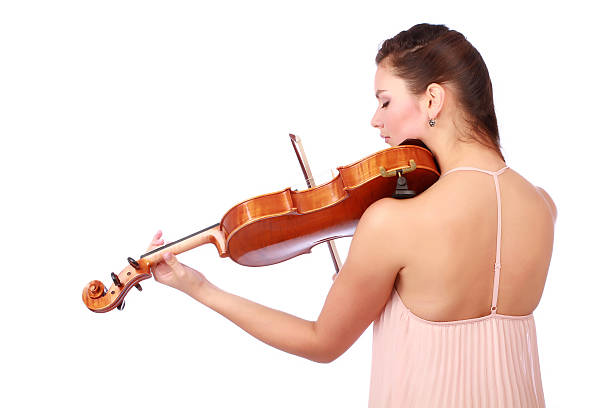 istock Beautiful female violinist playing music 159055718