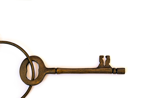 Old key isolated on white background. without shadow
