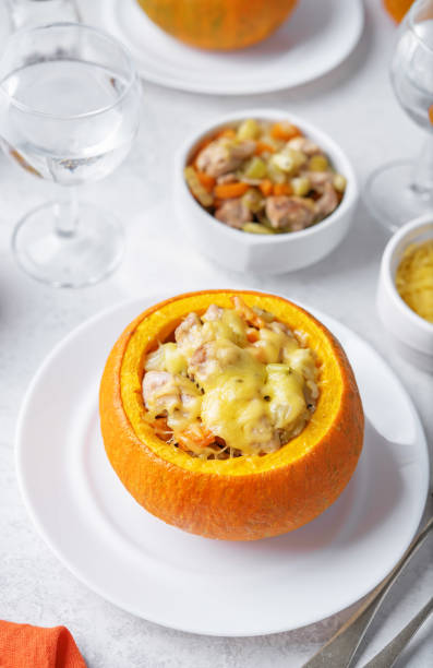 istock Pumpkin stuffed with chicken and carrots with celery 1590574095