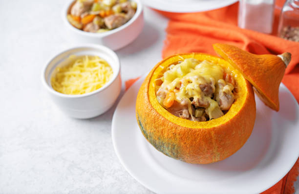 istock Pumpkin stuffed with chicken and carrots with celery 1590574096
