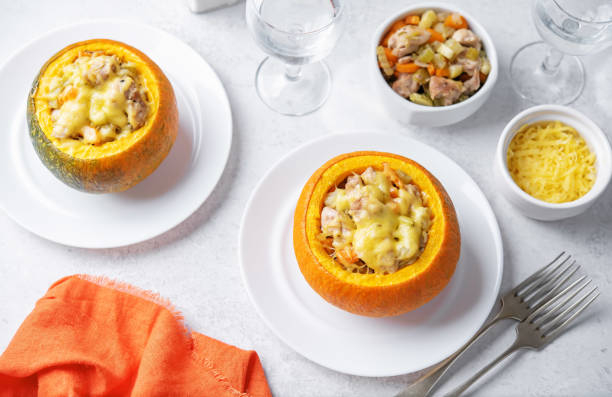 istock Pumpkin stuffed with chicken and carrots with celery 1590574101
