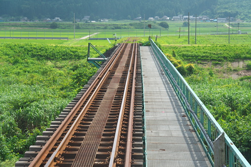 Akita, Japan - July 28, 2023: Single-track railway in rural zone in Akita, Japan