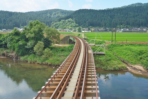 Akita, Japan - July 28, 2023: Single-track railway in rural zone in Akita, Japan