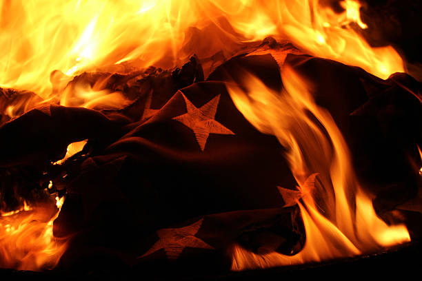 United States of America Flag burning in retirement ceremony stock photo
