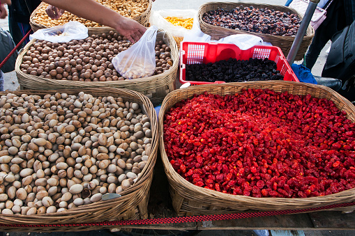 Cranberry, nuts and other berry fruits on a market