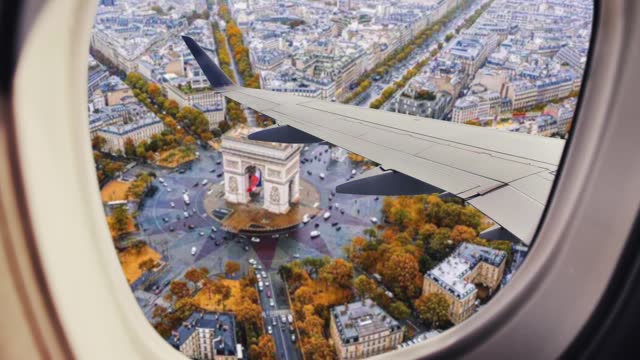 aerial view of the city of Paris, France, panoramic view through the window of the plane