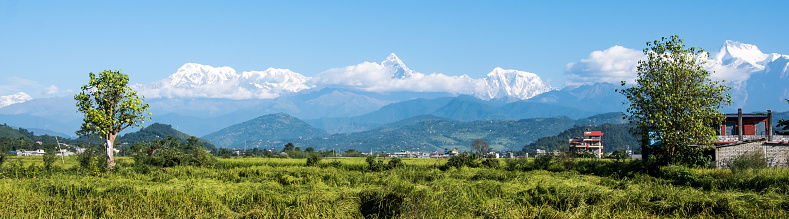 Panoramic view on beutiful Nepalese nature and Annapurna mountain range.
