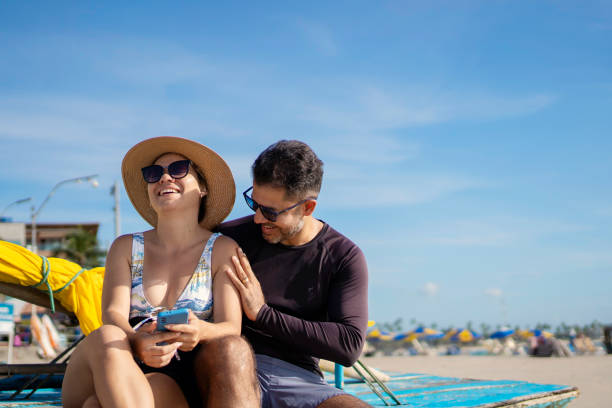 istock Beautiful couple on Brazilian beach 1590708186