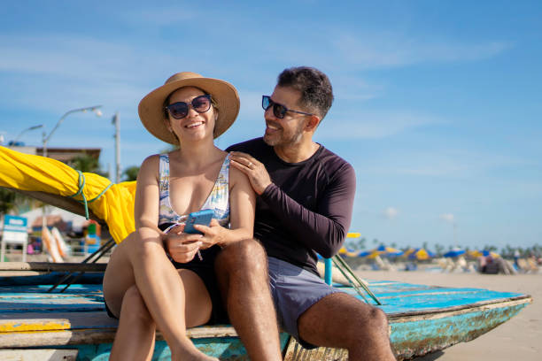 istock Beautiful couple on Brazilian beach 1590708192