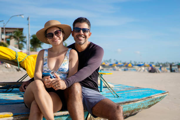istock Beautiful couple on Brazilian beach 1590708196