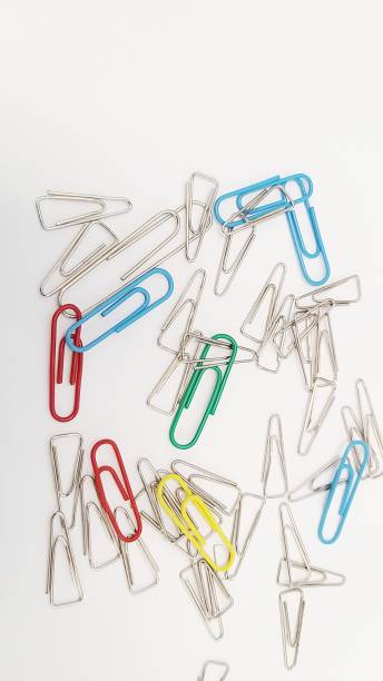 istock Multi colours paper clips isolated on a white background 1590732226