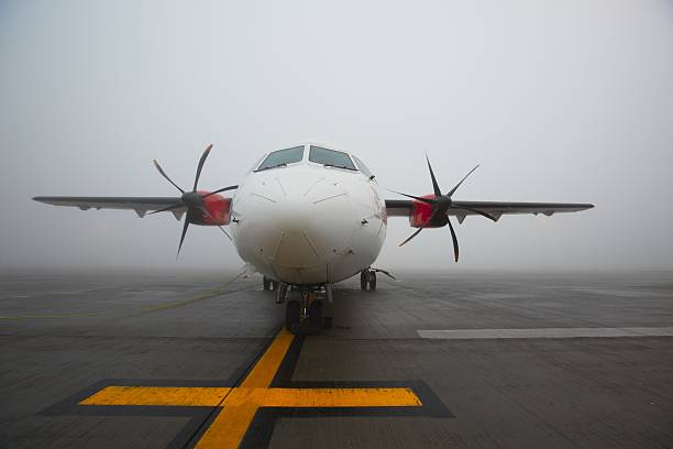istock Airplane in fog 159076060