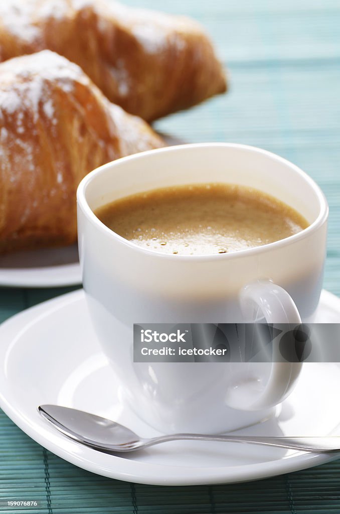 Coffee with croissants Morning cappuccino coffee with pastry on the wooden table Baked Pastry Item Stock Photo