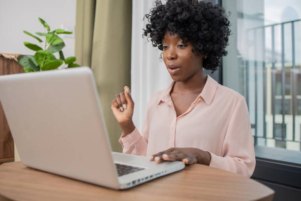 istock Young woman working from home 1590812246