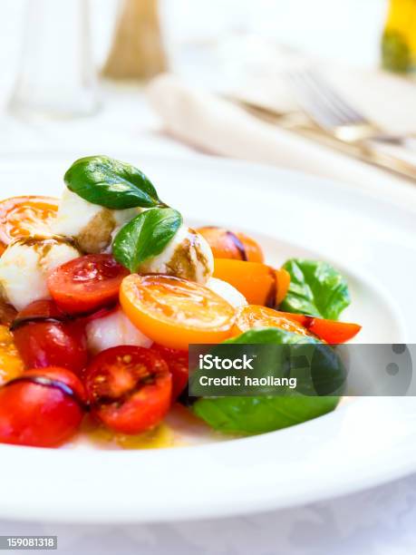 Closeup Of A Tomato And Mozzarella Salad Stock Photo - Download Image Now - Balsamic Vinegar, Basil, Cheese