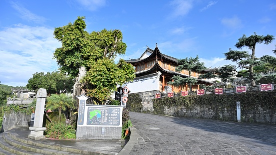 Chinese traditional colorful Baotuo lecture temples in the Putuoshan mountains, Zhoushan Islands,  a renowned site in Chinese bodhimanda of the bodhisattva Avalokitesvara (Guanyin)