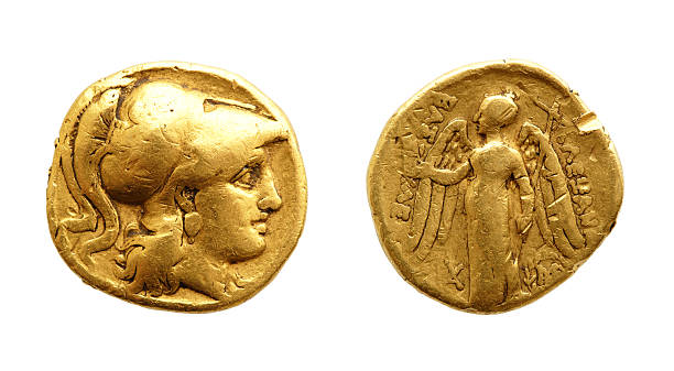 Ancient greek gold coin The two sides of an ancient gold coin isolated on white. ancient stock pictures, royalty-free photos & images