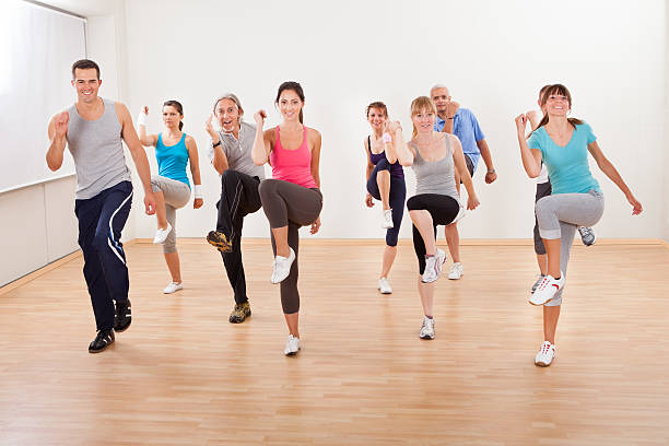 istock Group of people doing aerobics exercises 159088734