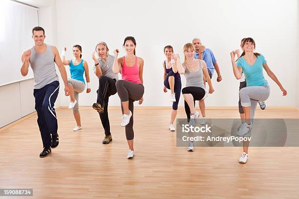 Group Of People Doing Aerobics Exercises Stock Photo - Download Image Now - Aerobics, Active Lifestyle, Activity
