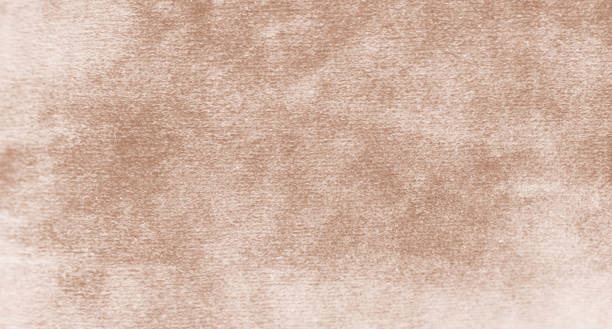 istock Surface of felted fabric texture abstract background in brown color. 1590915746