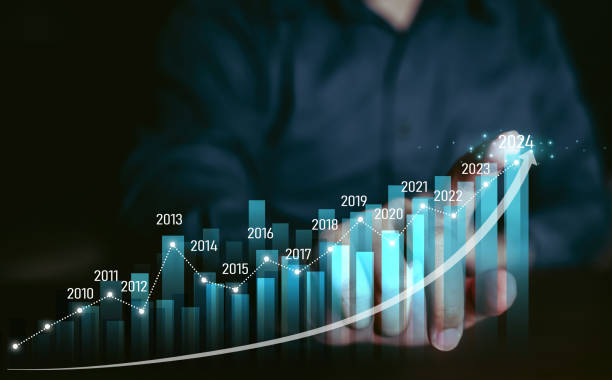 istock Concept business growing graph, chart with company progress and growth by year, 2024, economic growth, Business people check and analytic data of Annual Economic Growth Data. 1590922213