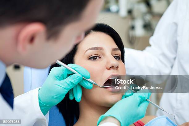 Examen Dental Foto de stock y más banco de imágenes de Adulto - Adulto, Asistencia sanitaria y medicina, Azul