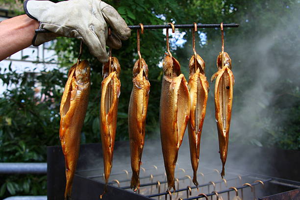 Smoked Trout smoked trout in a row forelle pear stock pictures, royalty-free photos & images