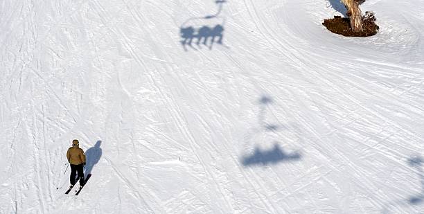 istock Skier and chairlift 159102906
