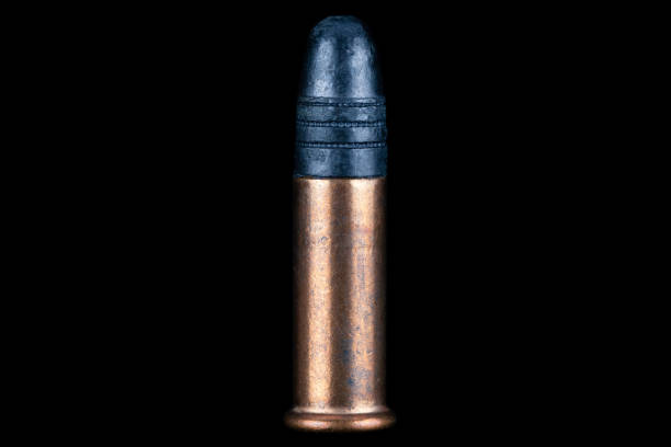 istock .22 caliber round isolated on black. 1591048916